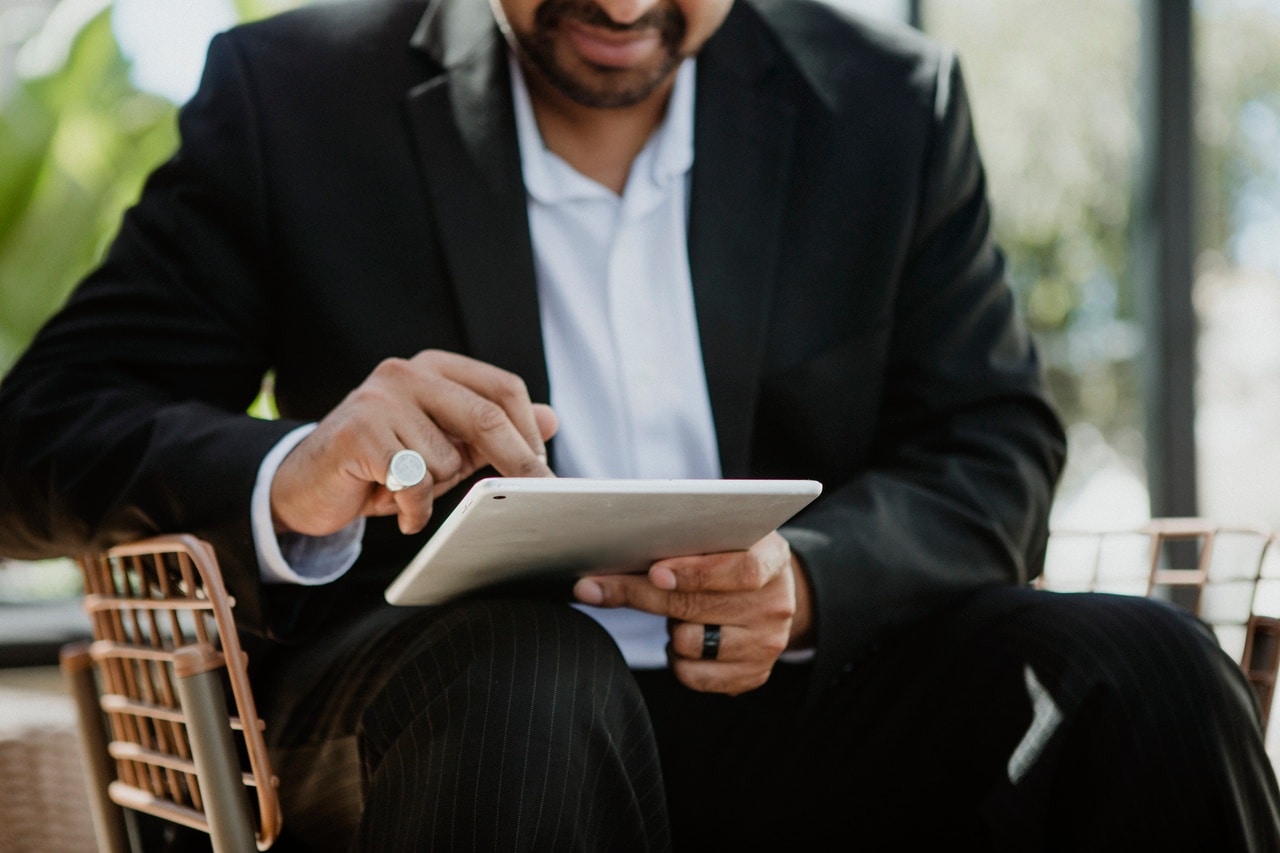 Man using digital tablet